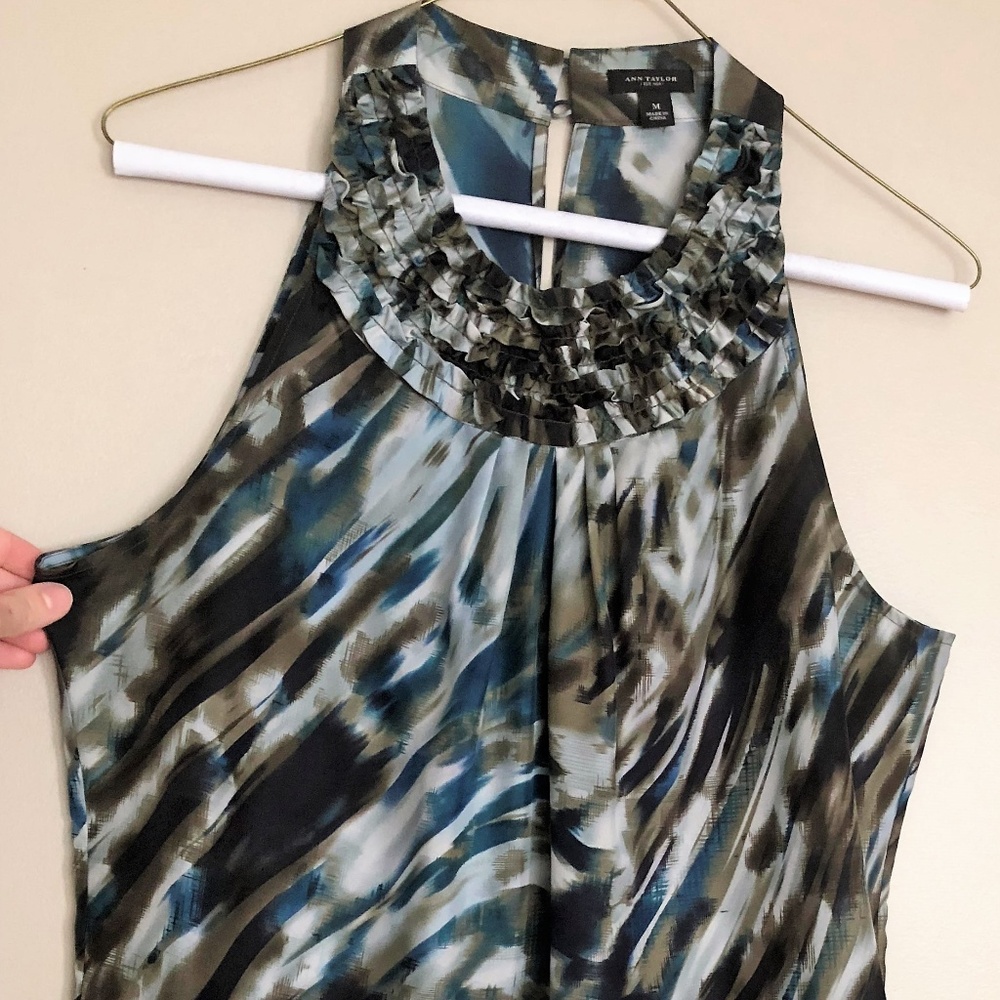 Sleeveless Blouse with Ruffle Neck Line